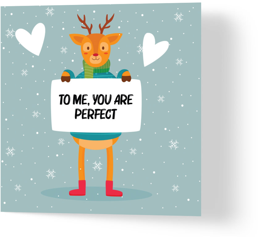 a christmas card depicting a reindeer wearing a jumper, scarf and boots holding a sign that reads 
