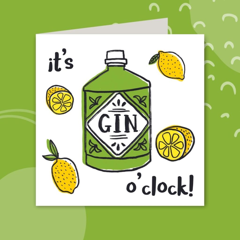 Image shows a white greeting card on a green background. The card shows an illustration of a green gin bottle, slices of lemon and reads 