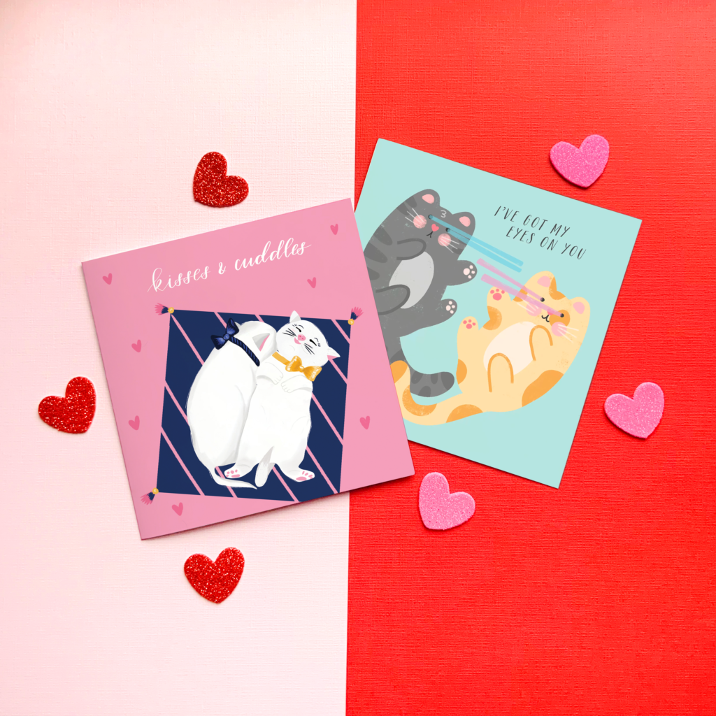 a pink and red background with two cat-themed valentine's day cards.