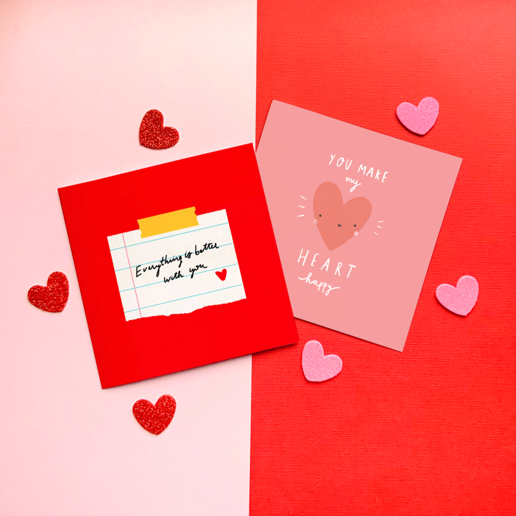 a pink and red background with two valentine's day cards on top